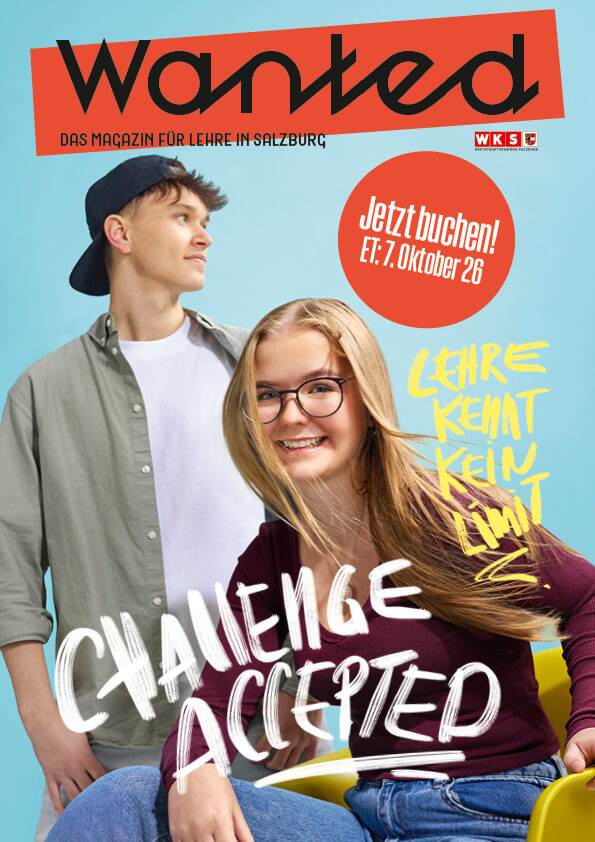 Das Bild zeigt ein Magazin-Cover mit zwei lächelnden Personen, einem Mann und einer Frau, die nebeneinander sitzen. Der Titel lautet "Wanted" mit dem Untertitel "Challenge Accepted". Es wird auf eine aktuelle Ausgabe hingewiesen, die ab dem 7. November 29 erhältlich ist.